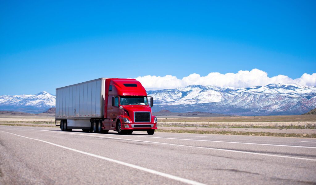 Semi truck with mountain in background